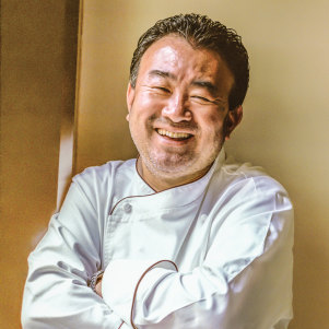 The chef-restaurateur has a quiet chuckle and eye for mischief.