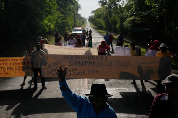 Anti-government demonstrators block the Pan-American Highway in Akua Yala, Panama, to protest against a law overhauling social security and against the Panama-U.S. memorandum concerning the Panama Canal.