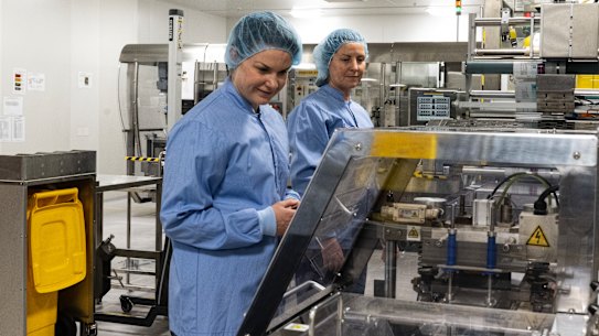 AstraZeneca staff Penny George and Geraldine Murphy at the firm’s Sydney production plant.