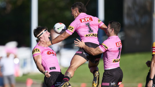 The Panthers celebrate a try by hooker Luke Sommerton (left).