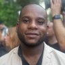 Fledgling content creator Amir Abdul-Kareem outside the courthouse for the trial of Sean “Diddy” Combs in New York.