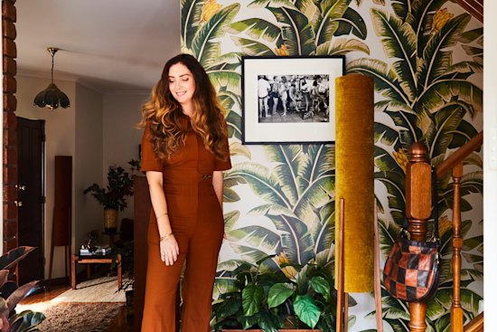 In keeping with the retro-inspired decor, Tamara installed this tropical-look wallpaper by Sydney designer Bethany Linz.