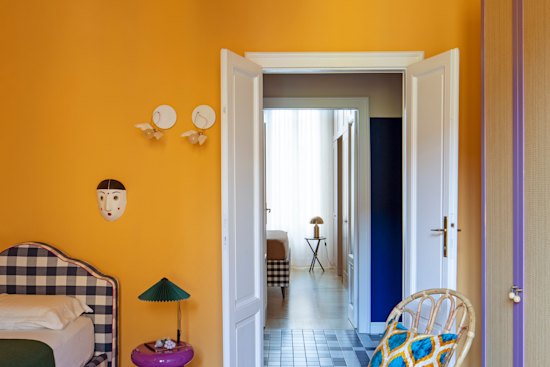 Hay’s “Matin” lamp sits on a stool by Kartell.