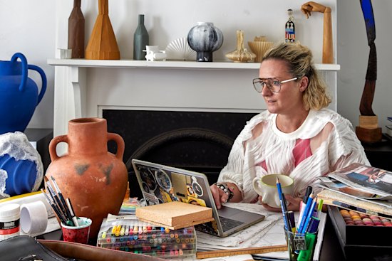 The living area, where Coffey works on her designs. The artwork is by Genevieve Felix Reynolds; the sculpture (at far right) is by Luke Storrier.