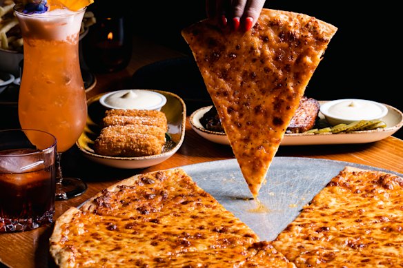 Slices start at $7 at Pizza Pizza Pizza.