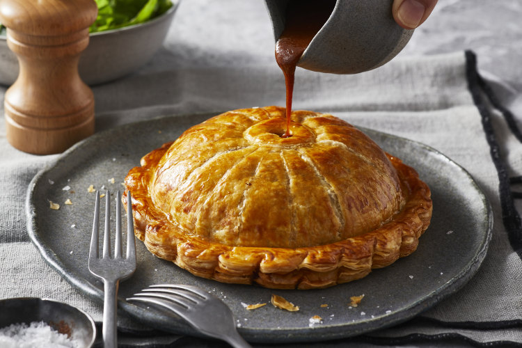 The chimney tube creates the pie’s signature “gravy hole” for serving.