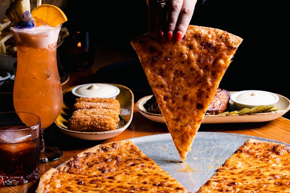Pizza Pizza Pizza does slices late into the night.