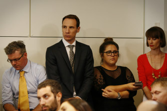 Hayden Cooper listens as then prime minister Malcolm Turnbull addresses the media in 2017.
