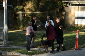 Family members of residents gather outside Anglicare's Newmarch House in Caddens on May 5. 