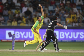 Mitch Starc sends down a delivery.