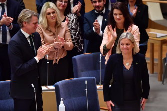Magdalena Andersson, right, is congratulated after being appointed to new Swedish prime minister.
