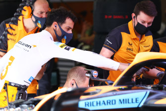 Daniel Ricciardo talks to his engineers at McLaren during the final practice ahead of the F1 Grand Prix in Bahrain in March.