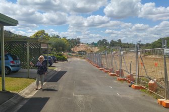 Julia Mayfield outside the unit in mid-2018, before the sound barrier was built but after the 28 units were resumed.