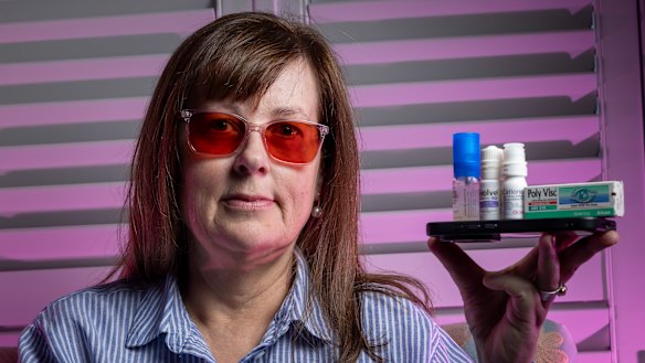 Sonia Robertson frequently uses eye drops to manage her dry eye disease.