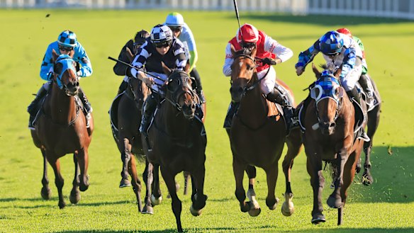 Explosive Jack (right) wins the Australian Derby at Royal Randwick earlier this year. 
