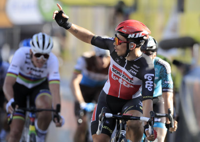 Australia's Caleb Ewan celebrates after crossing the finish line to win stage 11 of the Tour de France cycling race over 167.5 kilometers from Chatelaillon-Plage to Poitiers Wednesday, Sept. 9, 2020. 