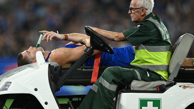 North Melbourne’s Callum Coleman-Jones is taken from the ground.