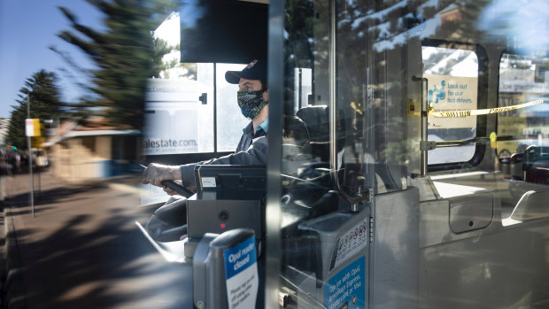 A NSW bus driver wears a homemade face mask whilst working.
