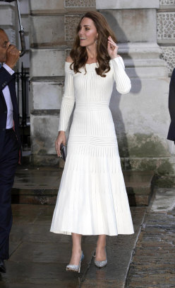 The Duchess of Cambridge arrives for the first annual gala dinner in recognition of Addiction Awareness Week. She wore a white off shoulder Barbara Casasola dress, pairing her look with silver embellished Jimmy Choo heels.