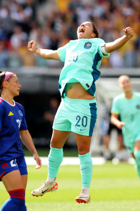 Sam Kerr celebrates scoring one of her three goals against the Philippines at Optus Stadium on Sunday.