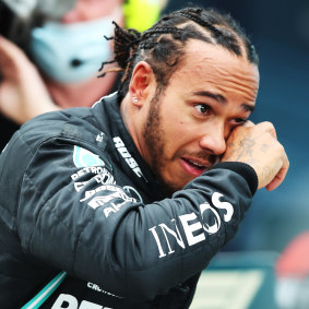 Lewis Hamilton celebrates winning his seventh F1 championship.