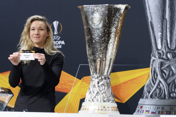 Josephine Henning shows Roma's name as part of the Europa League draw.