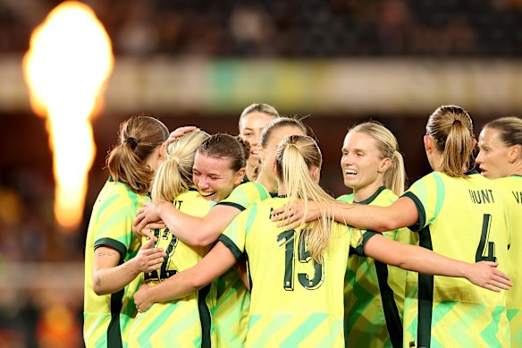 Kahli Johnson of Australia celebrates scoring a goal on debut.