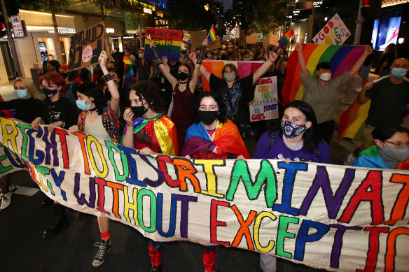 Protestors in Brisbane rally against the bill, after Citipointe Christian College asked parents to sign off on excluding LGBTQI students.  