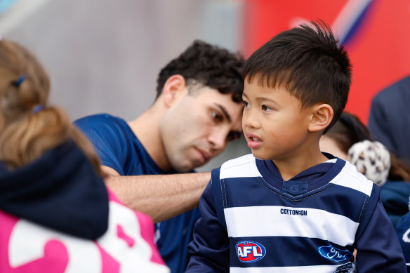 Tyson Stengle signing autographs before Saturday’s game.