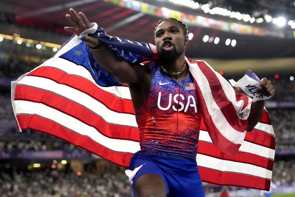 Noah Lyles celebrates his thrilling victory in the men’s 100 metres.