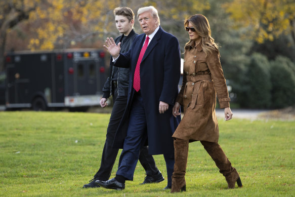 Then-president Donald Trump with wife Melania Trump and their son Barron Trump in Washington in 2019.