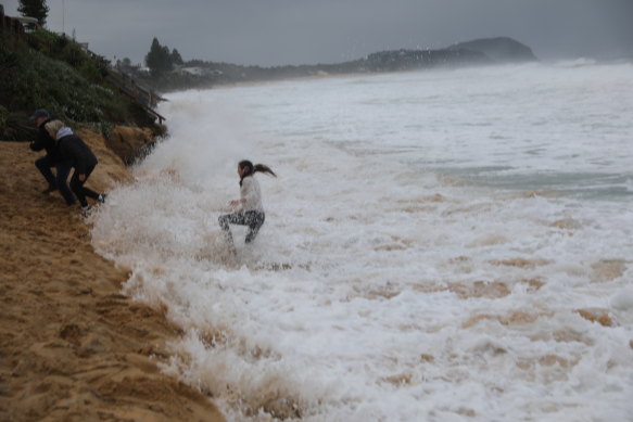 The waves continue to push further inland.