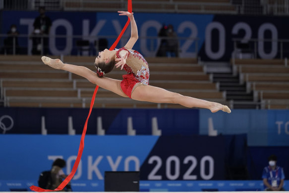 Dina Averina, of Russian Olympic Committee, performs during the rhythmic gymnastics individual all-around final at the 2020 Summer Olympics.