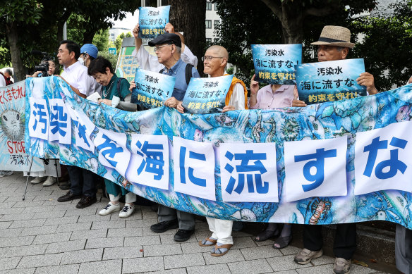 Protesters outside the prime minister’s residence in Toyko, Japan on Friday.