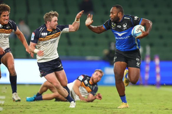 Manasa Mataele of the Force fends off Ryan Lonergan of the Brumbies.