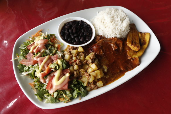 A hearty lunch of rice, beans, vegetables and chicken