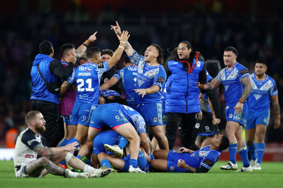 Samoa celebrates the historic win over England.