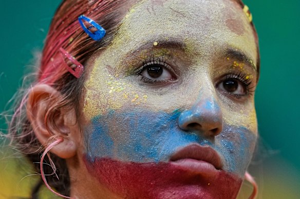 A fan arrives ahead of Colombia v DR Congo. 