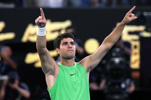 Alcaraz celebrates his remarkable five-set triumph.