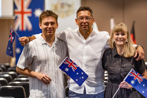 Jesse Collins, Iain Collins and Bec Swinton at the Australia Day citizenship ceremony in Frankston on Friday.