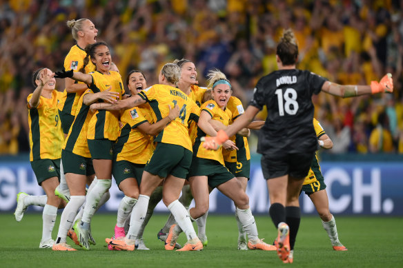 The Matildas celebrate.