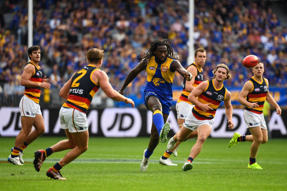 Nic Naitanui, centre, in action. 