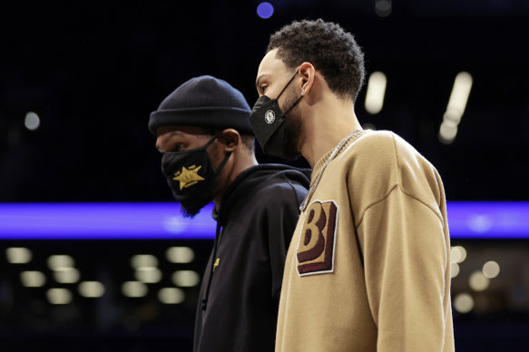 Ben Simmons (right) is yet to debut for the Nets.