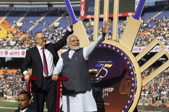 Anthony Albanese and Narendra Modi wave to the crowd before the fourth Test in Ahmedabad.