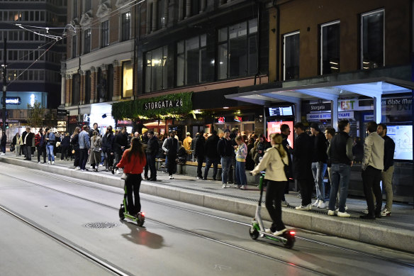 People out on the streets after the end of COVID-19 restrictions in Oslo on Saturday.