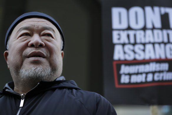 Chinese artist Ai Weiwei supporting Julian Assange outside the hearing at the Old Bailey in London.