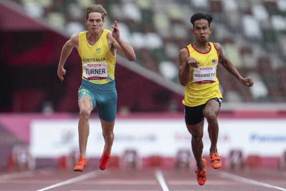 James Turner (left) makes his way down the track.