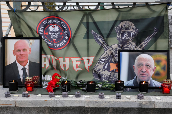 Portraits of Wagner’s Yevgeny Prigozhin (right) and Dmitry Utkin at a makeshift memorial on August 24.
