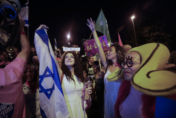 Israelis in Jerusalem celebrate the swearing in of the new government on  Sunday.