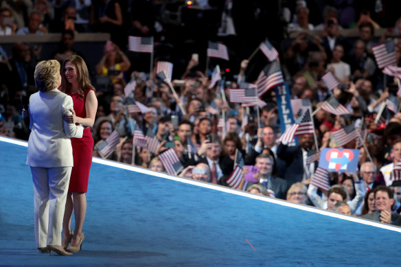 2016 Democratic presidential nominee Hillary Clinton embraces her daughter Chelsea after being introduced on the fourth day of the Democratic National Convention in Philadelphia, Pennsylvania.